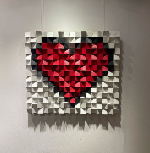 لوحة حائط علي شكل قلب